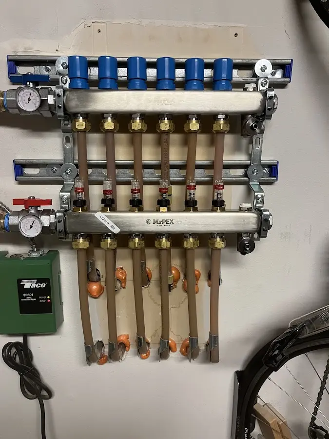 Plumber performing Gas Line Installation at a residential property in Ward